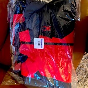 Red brand new, still in the bag Spyder boys ski jacket, size 18